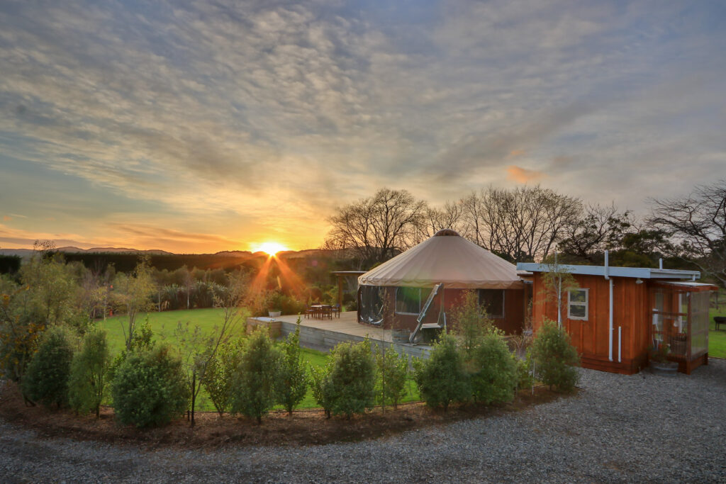 The sunrise over the hills behind the yurt. 